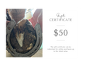Gift certificate for $50 with a horseshoe containing a horse's tooth on a white background